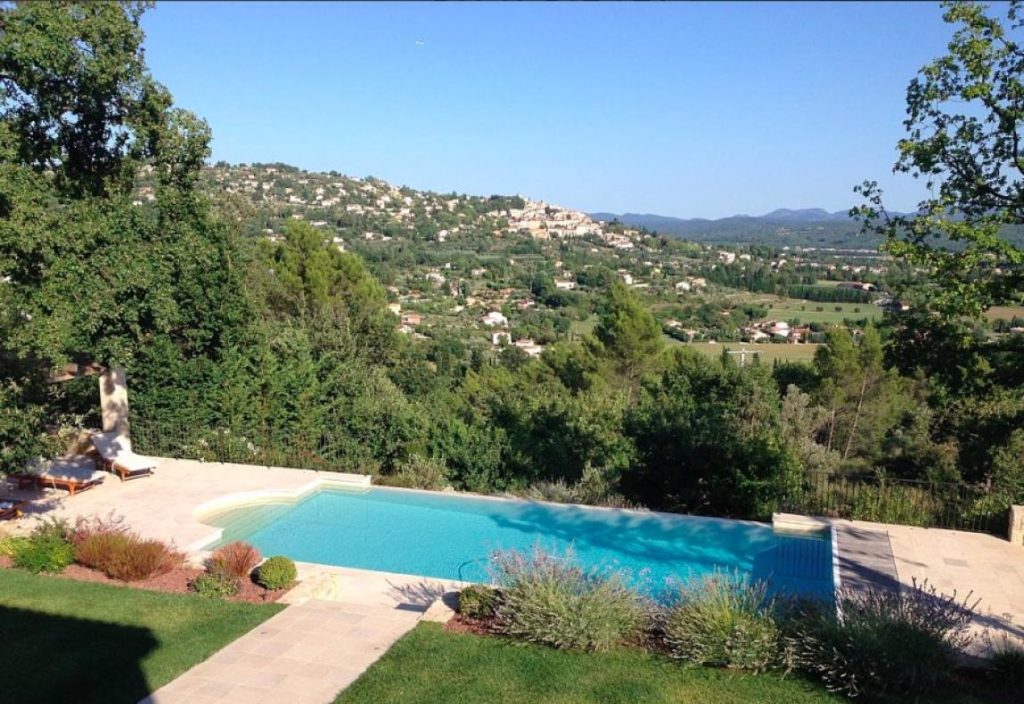 View from the infinity pool across the valley from the gardens of  Villa Vue de Fayance in the Cote d'Azur