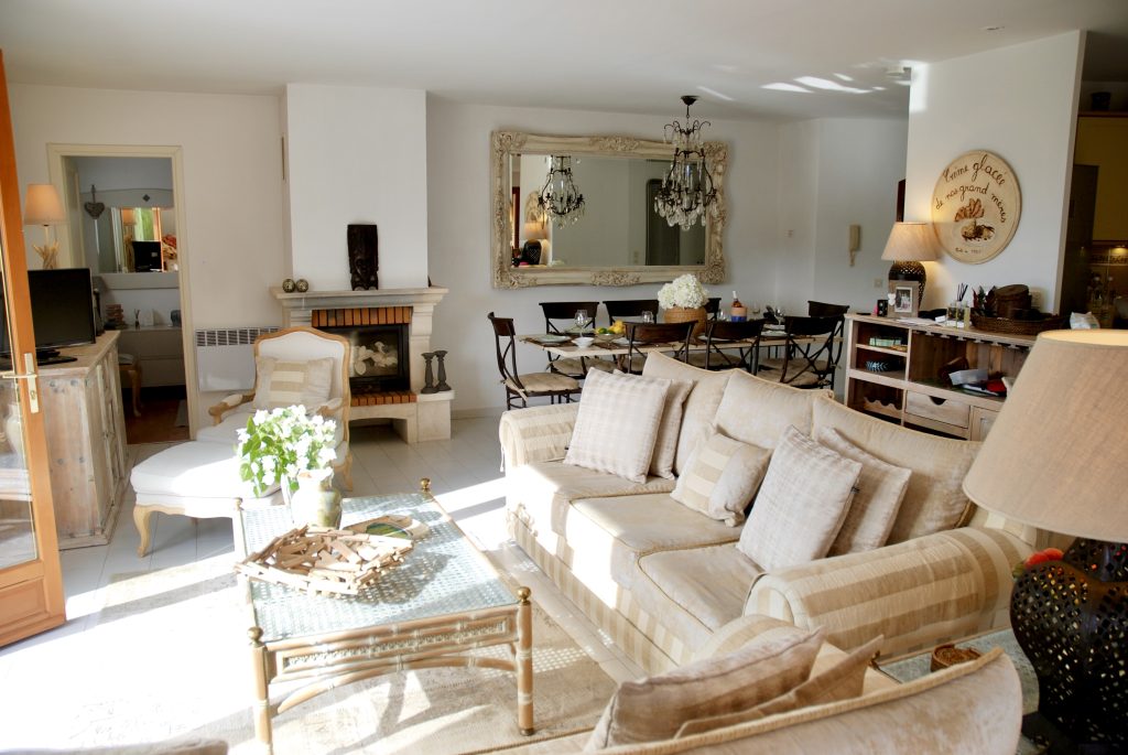 View of the large open plan living and dining room in this Provencal holiday villa