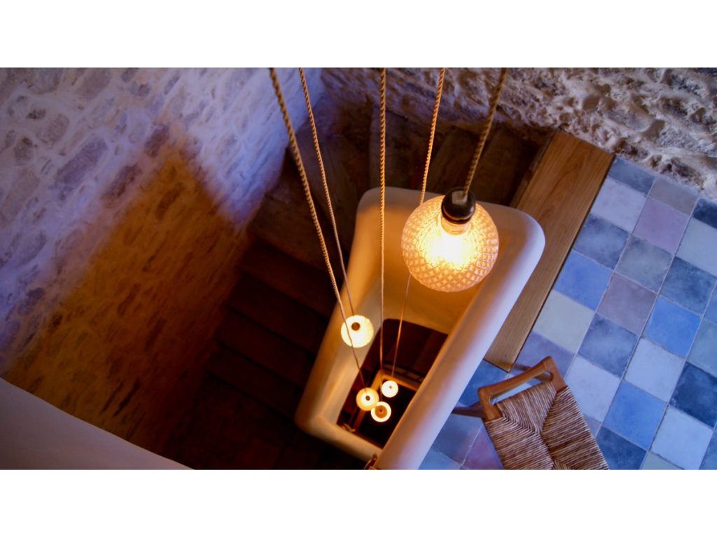 A stylishly renovated staircase in in the South of France